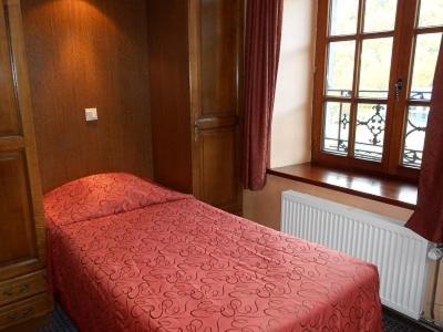 Postel nebo postele na pokoji v ubytování Hotel IL Castellino