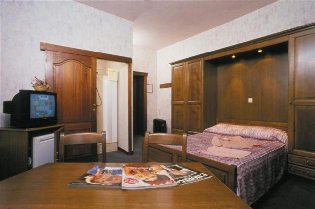 TV a/nebo společenská místnost v ubytování Hotel IL Castellino