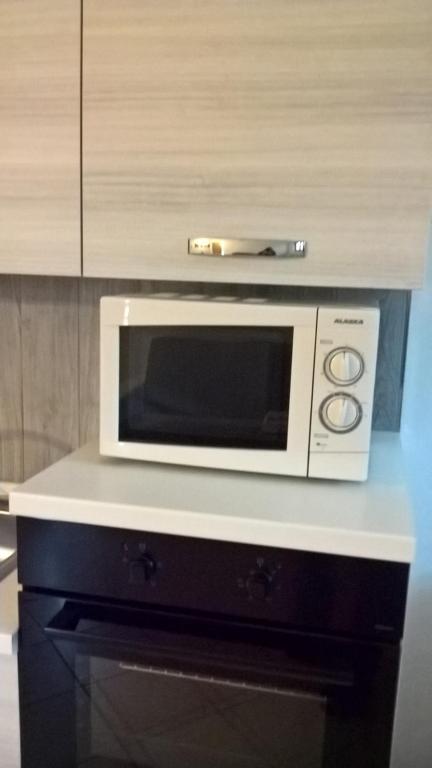 Kuchyň nebo kuchyňský kout v ubytování ACERO ROSSO B&B in Franciacorta