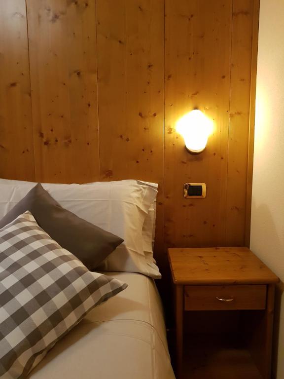 Postel nebo postele na pokoji v ubytování Hotel Cima Piazzi