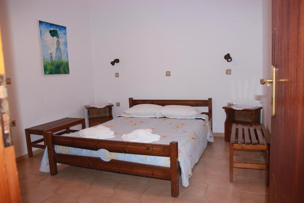 Posteľ alebo postele v izbe v ubytovaní Tasos Cottages