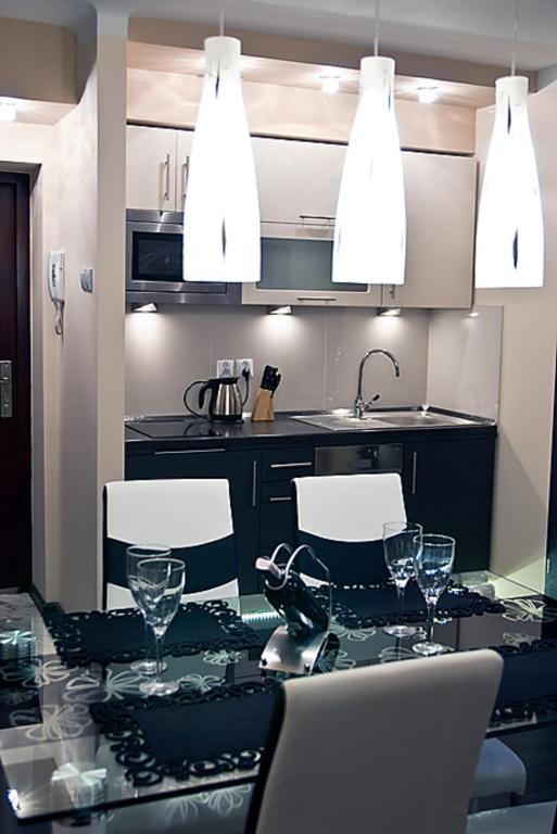 Kuchyňa alebo kuchynka v ubytovaní Apartament Kryształowy