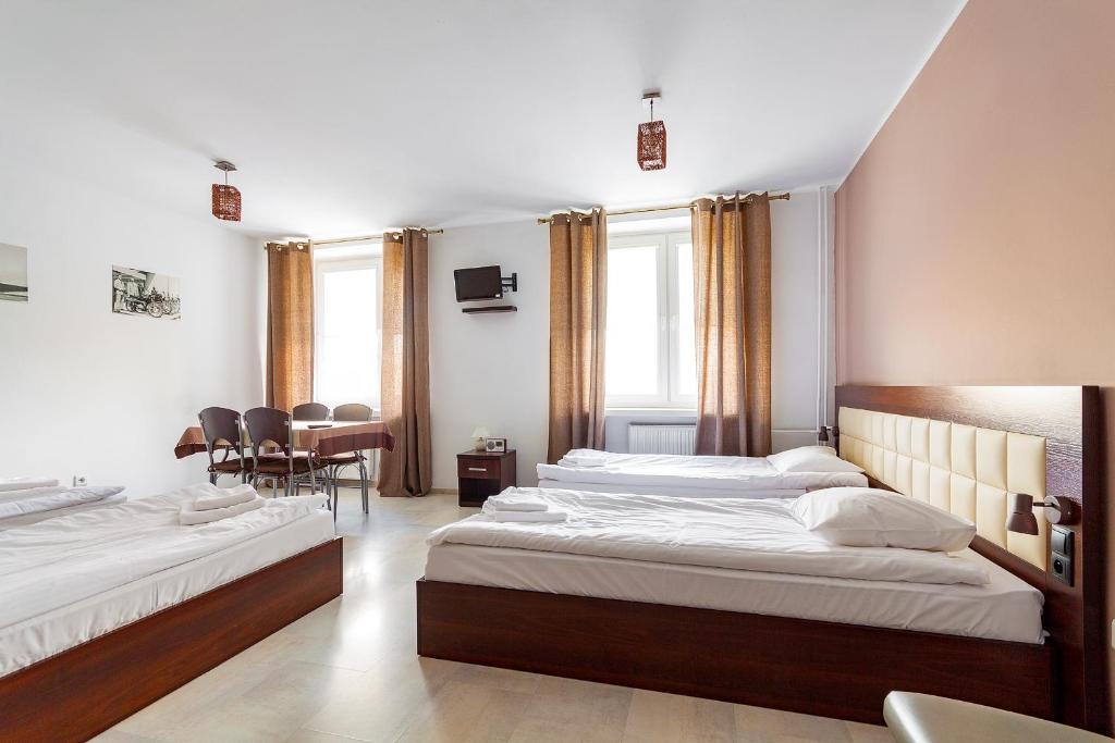 Posteľ alebo postele v izbe v ubytovaní Avion Hotel