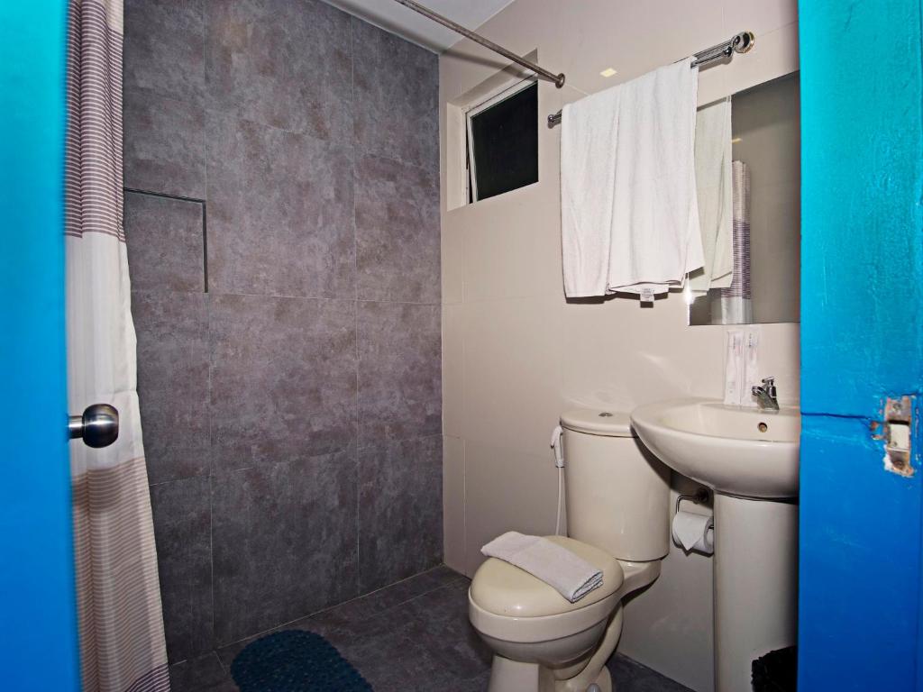 Koupelna v ubytování Skyblue Hotel
