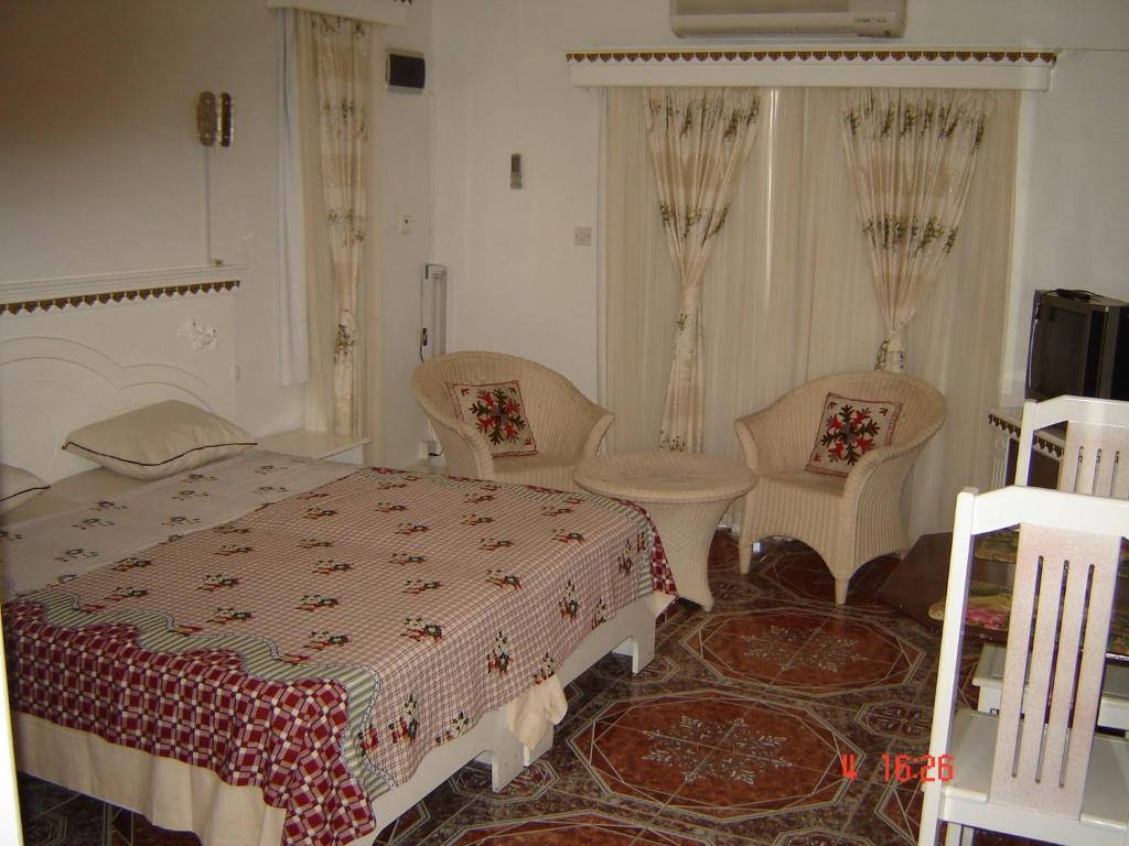 Postel nebo postele na pokoji v ubytování Apartments la Colombe