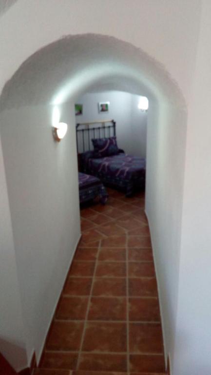 Postel nebo postele na pokoji v ubytování Cueva El Jaraiz