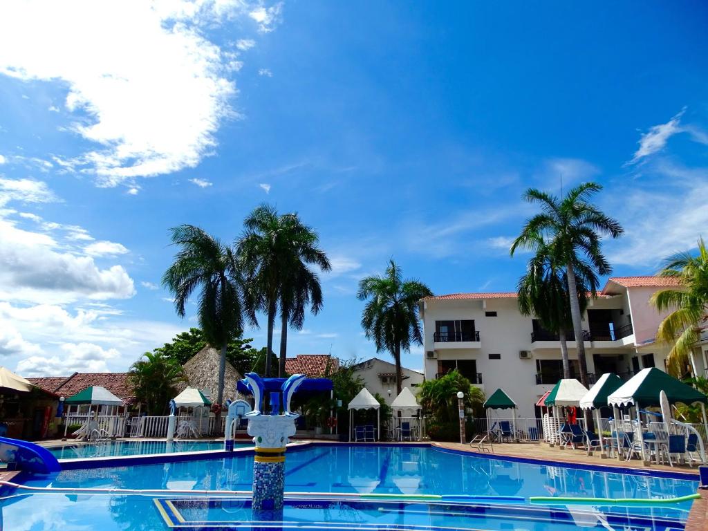 Bazén v ubytování Alborada Hotel Melgar nebo v jeho okolí