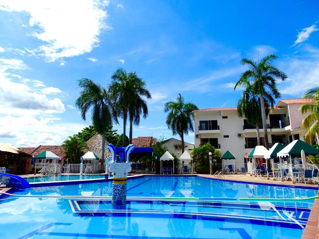 Bazén v ubytování Alborada Hotel Melgar nebo v jeho okolí