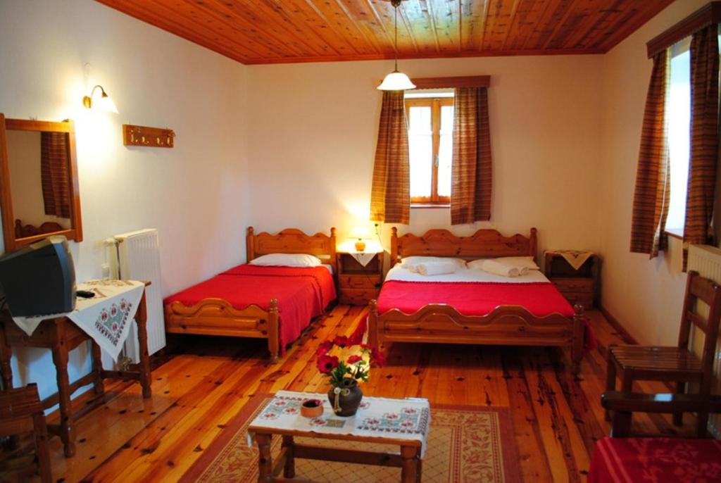 Postel nebo postele na pokoji v ubytování Hotel Kaiti