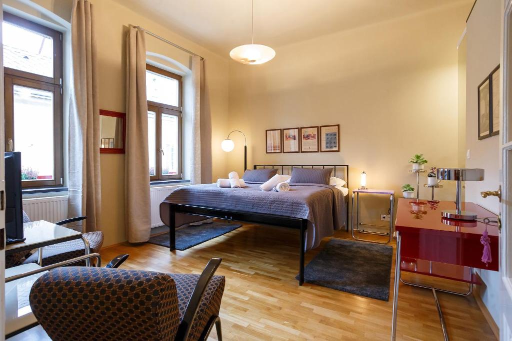 Postel nebo postele na pokoji v ubytování Hotel & Depandance Kopacka