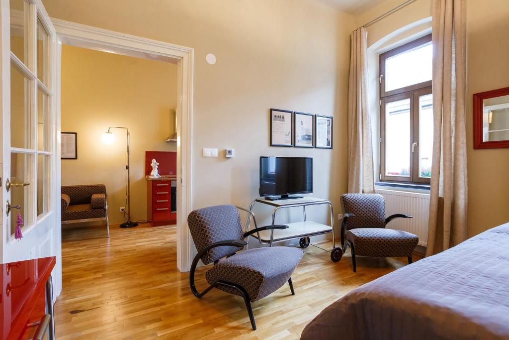 TV a/nebo společenská místnost v ubytování Hotel & Depandance Kopacka