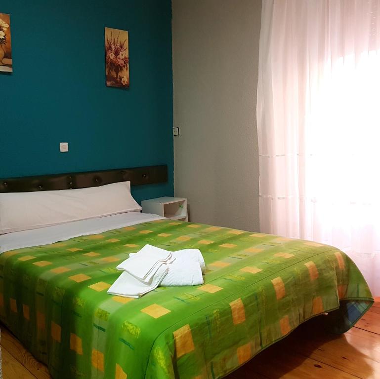 Posteľ alebo postele v izbe v ubytovaní Hostal Padre Isla 1