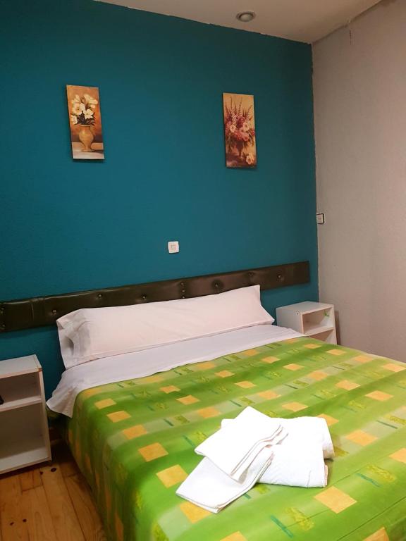 Posteľ alebo postele v izbe v ubytovaní Hostal Padre Isla 1