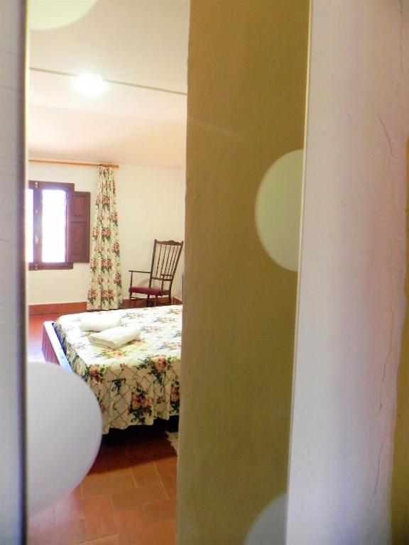 Postel nebo postele na pokoji v ubytování Mas de Muñoz