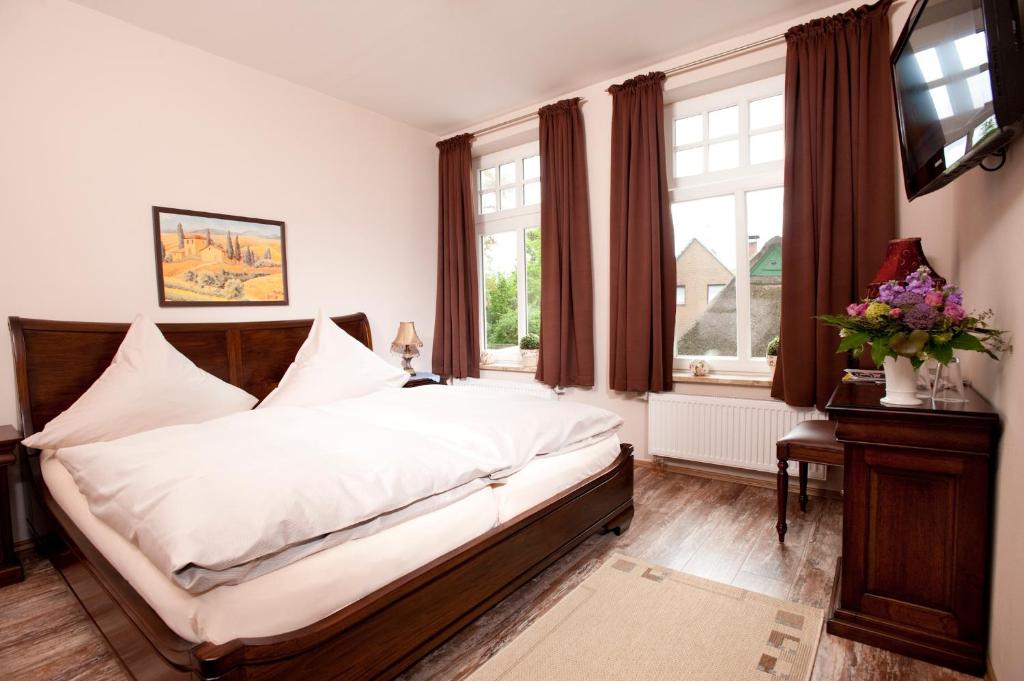 Postel nebo postele na pokoji v ubytování Hotel Bess