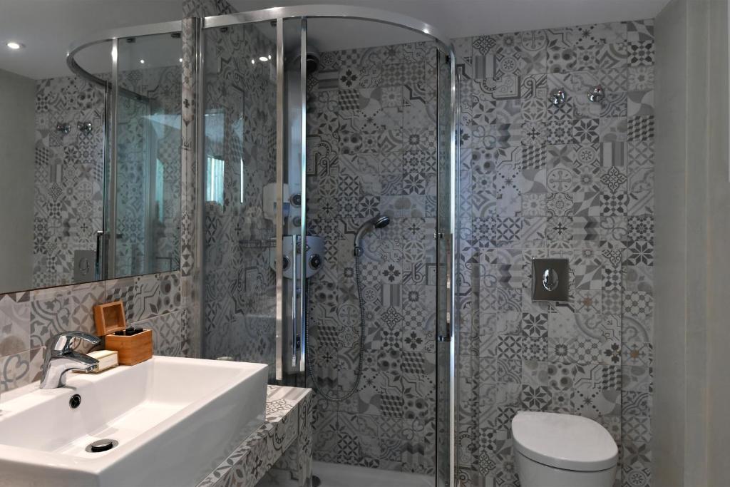Koupelna v ubytování Kalypso Hotel