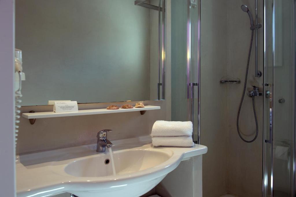 Koupelna v ubytování Kalypso Hotel
