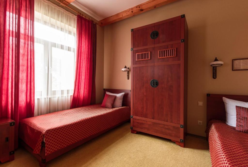Postel nebo postele na pokoji v ubytování Letuchiy Gollandets