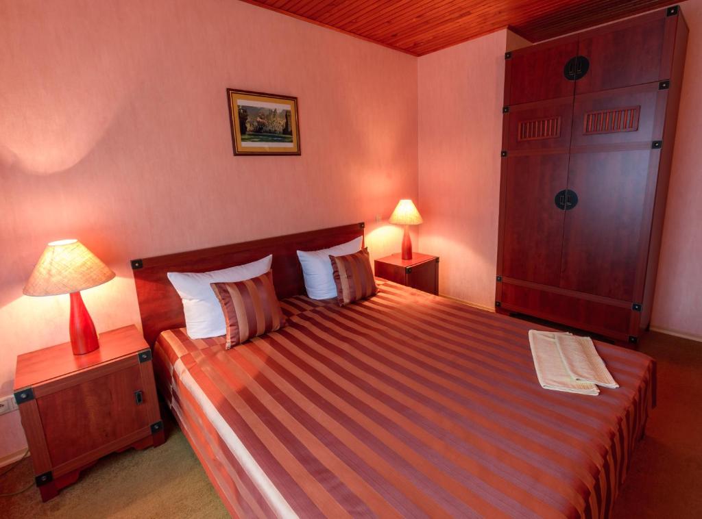 Postel nebo postele na pokoji v ubytování Letuchiy Gollandets