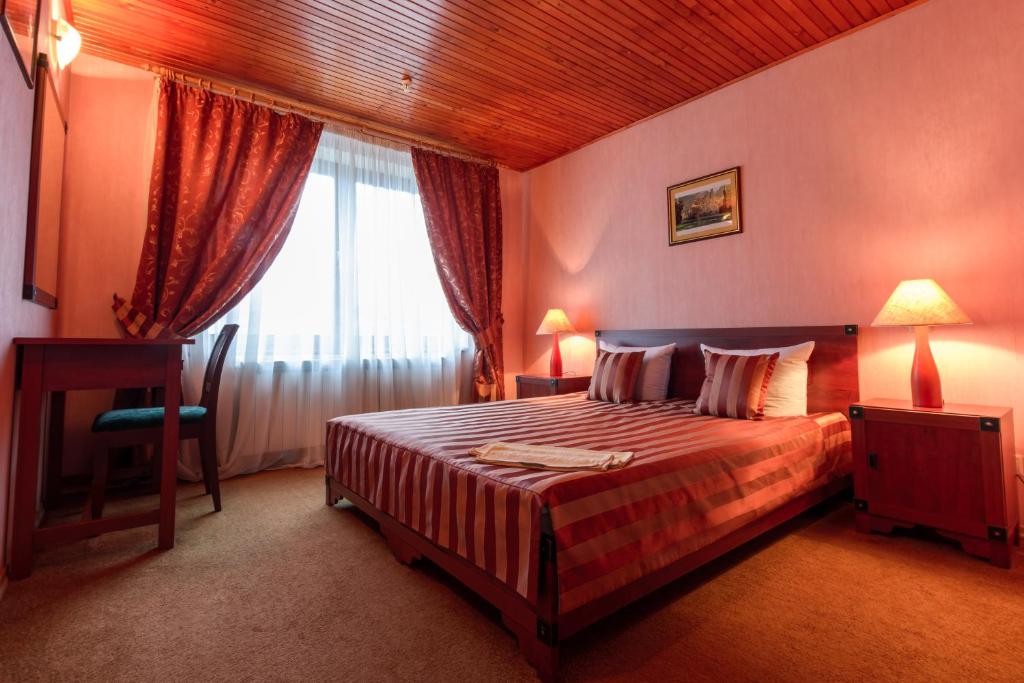 Postel nebo postele na pokoji v ubytování Letuchiy Gollandets
