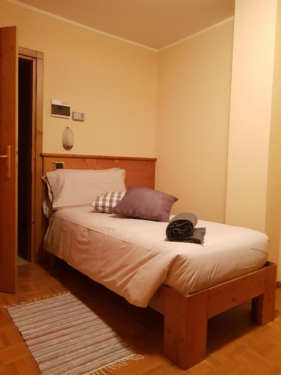 Postel nebo postele na pokoji v ubytování Hotel Cima Piazzi