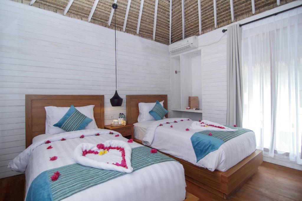 Postel nebo postele na pokoji v ubytování Sadev Resort