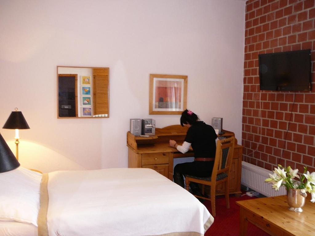 Postel nebo postele na pokoji v ubytování Hotel-Park-Residenz