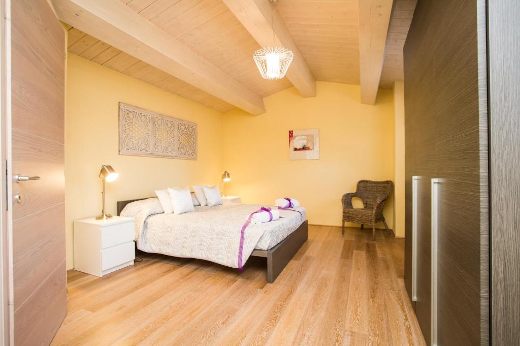 Postel nebo postele na pokoji v ubytování Cignella Resort