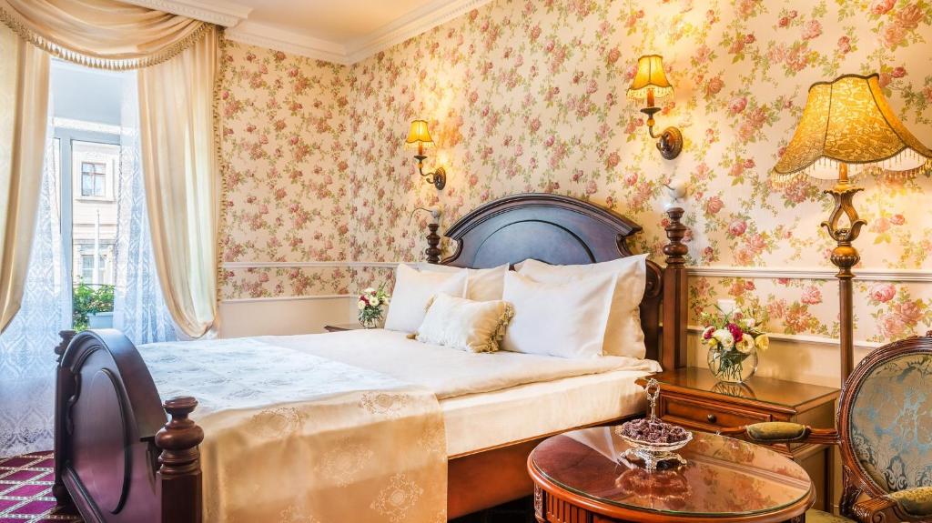 Postel nebo postele na pokoji v ubytování Frederic Koklen Boutique Hotel
