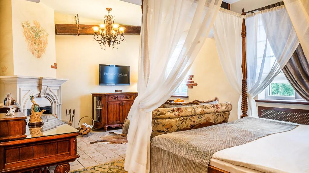 Postel nebo postele na pokoji v ubytování Frederic Koklen Boutique Hotel