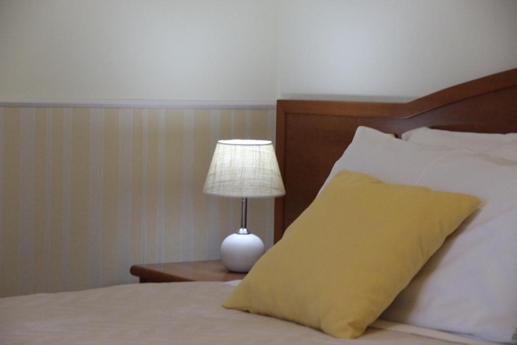 Postel nebo postele na pokoji v ubytování Villa Julia
