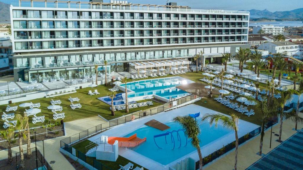 an aerial view of a hotel with a swimming pool at 30º Hotels - Hotel Dos Playas Mazarrón in Puerto de Mazarrón