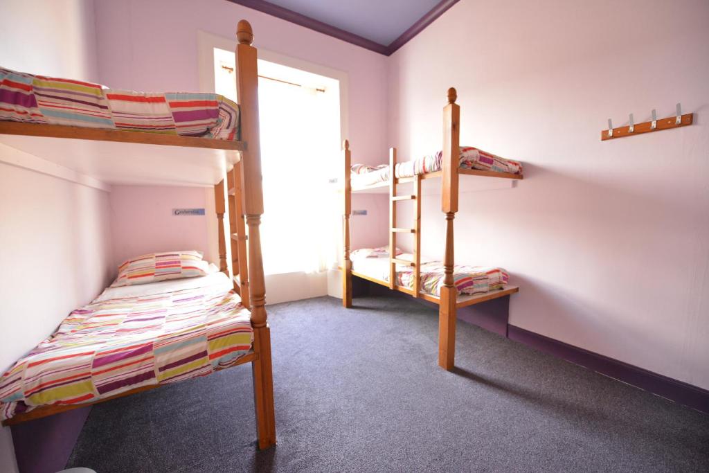 Postel nebo postele na pokoji v ubytování Oban Backpackers