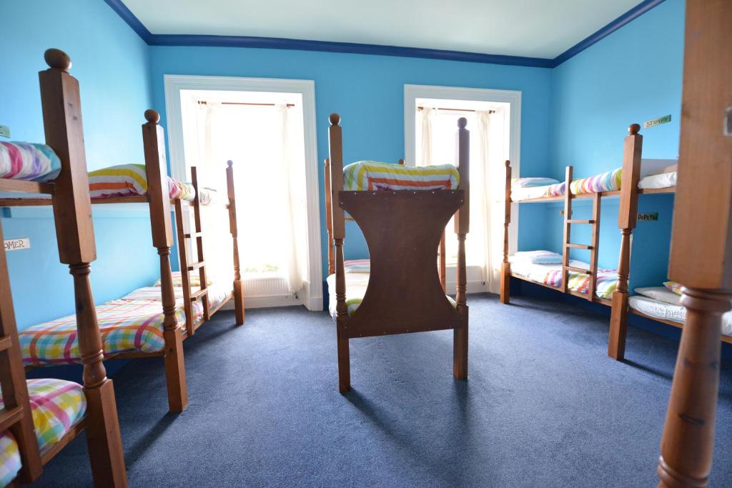Postel nebo postele na pokoji v ubytování Oban Backpackers