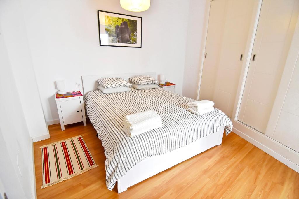 Posteľ alebo postele v izbe v ubytovaní Serendipity Apartments