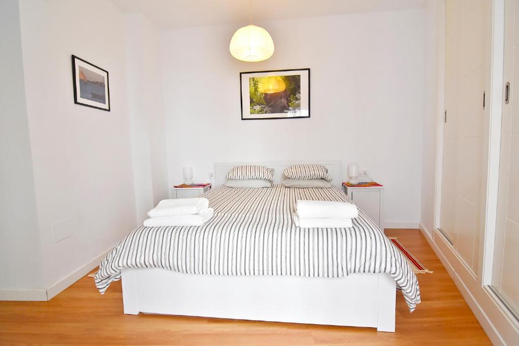 Posteľ alebo postele v izbe v ubytovaní Serendipity Apartments