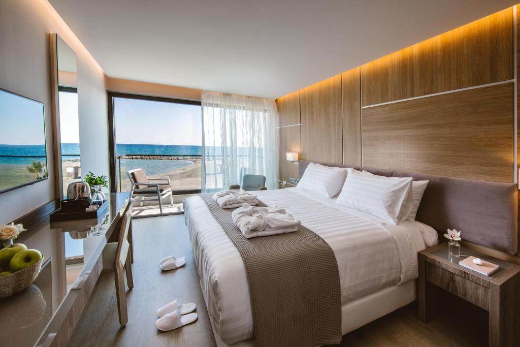 TV a/nebo společenská místnost v ubytování Lebay Beach Hotel
