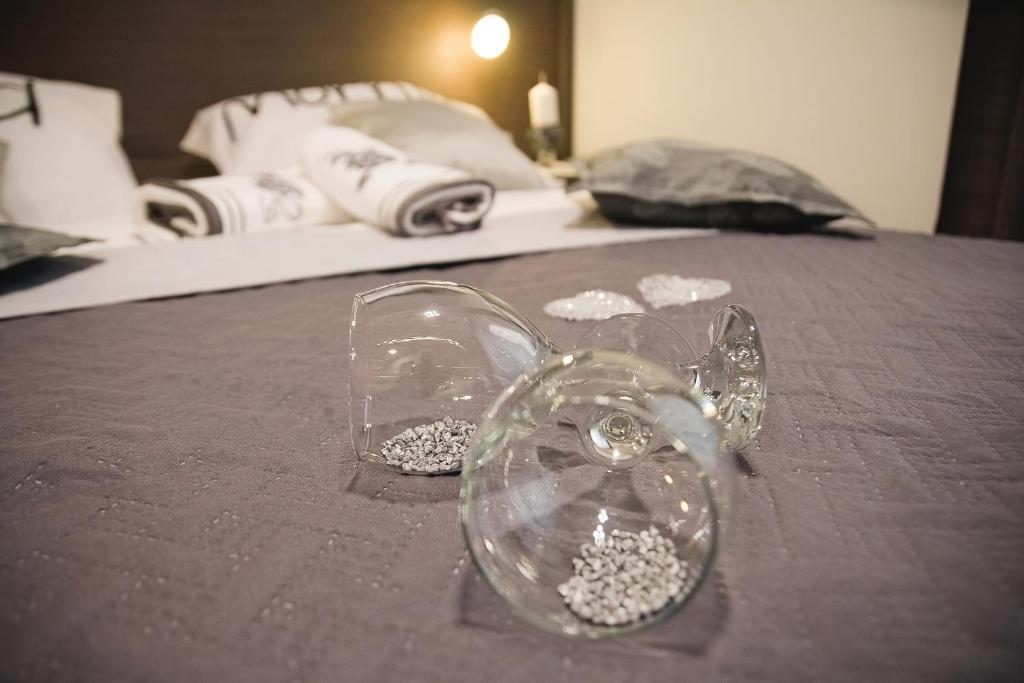 Łóżko lub łóżka w pokoju w obiekcie Holiday Center Ivona