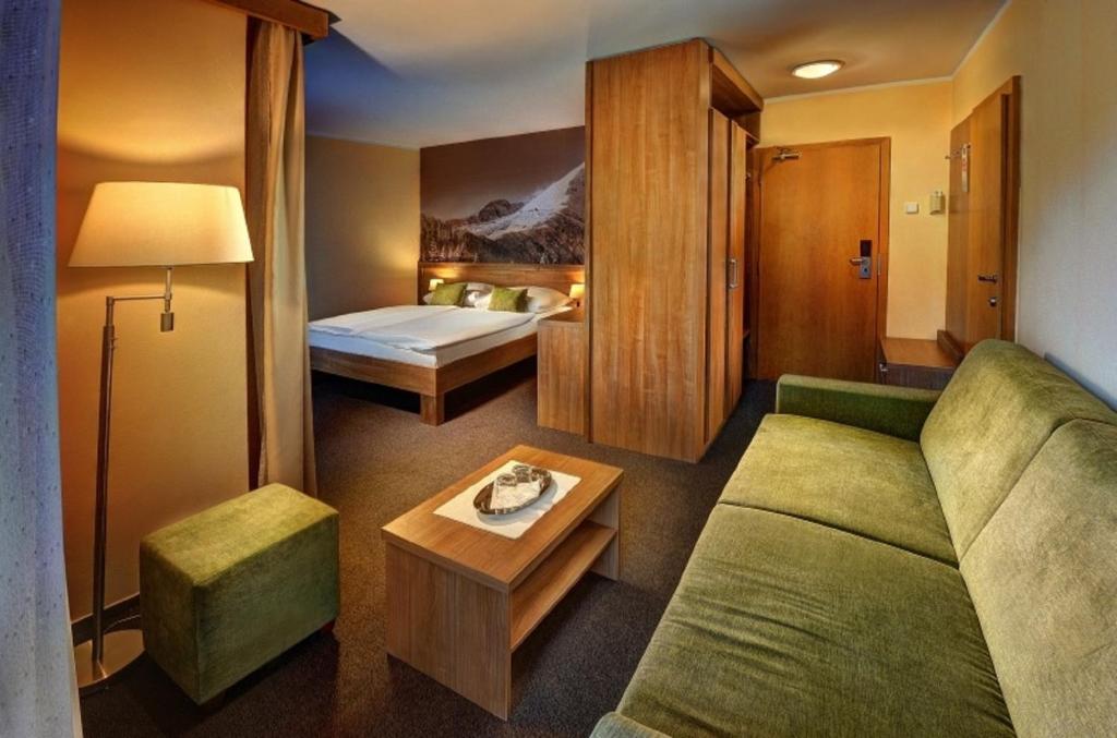 Postel nebo postele na pokoji v ubytování Hotel FIS