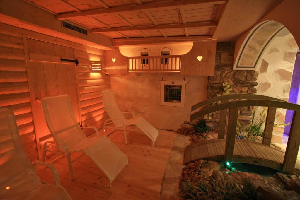 Posezení v ubytování Hotel Chalet Alaska