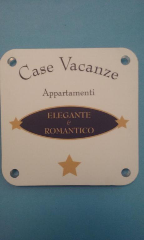 a sign for a case vazaarmaarmaarmaplementricularricular influenza epidemic at Appartamenti "Elegante & Romantico" in Trapani