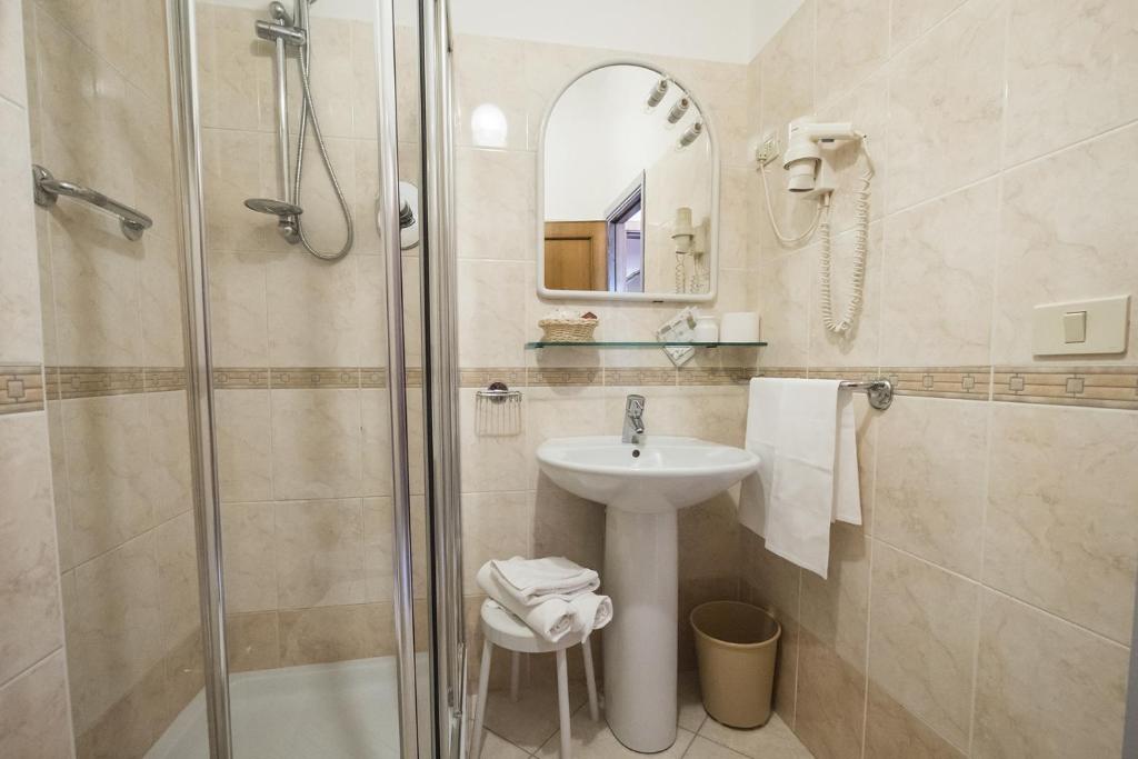 Koupelna v ubytování Grifone Hotel