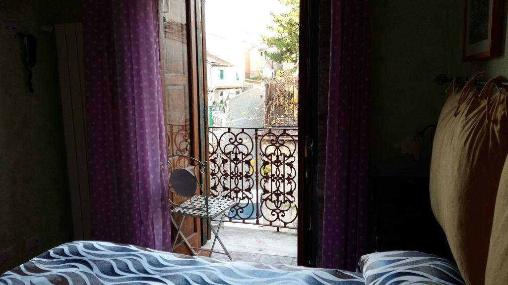 A bed or beds in a room at Borgo La Forgia
