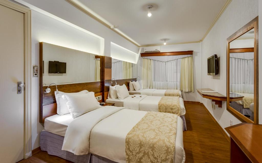 Postel nebo postele na pokoji v ubytování Kuster Hotel