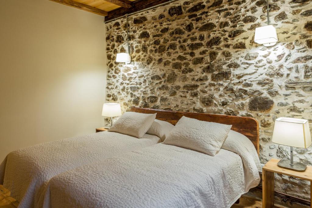 Posteľ alebo postele v izbe v ubytovaní Casa Rural "Casa Chin", Val d'Aran