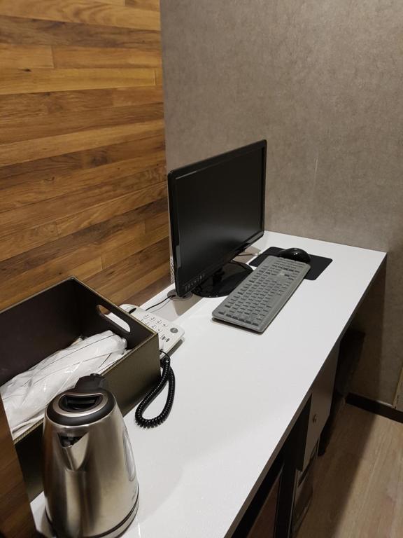 TV a/nebo společenská místnost v ubytování Line Motel