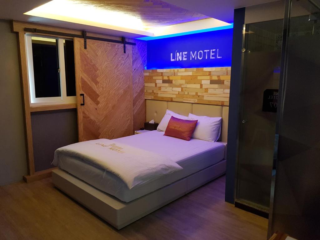 Postel nebo postele na pokoji v ubytování Line Motel