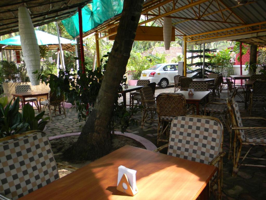 Restaurace v ubytování Maria Paulo Guest House Bar and Restaurant