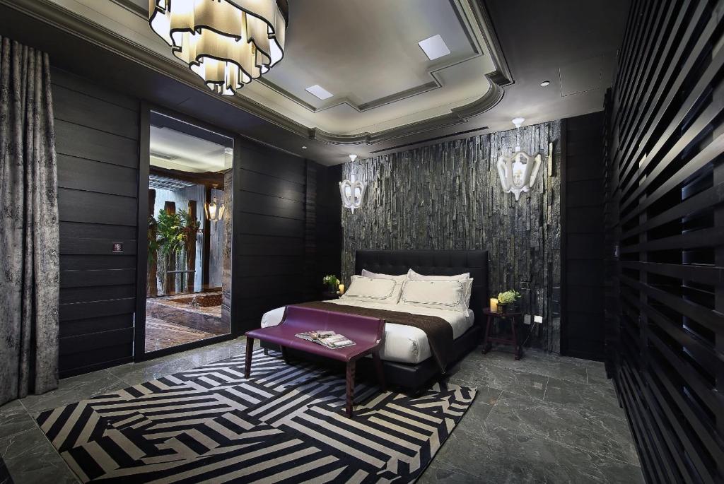 Postel nebo postele na pokoji v ubytování Ease Motel Taichung