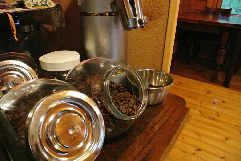 a counter with bowls and other food items on it at Polan no Fue in Minamioguni